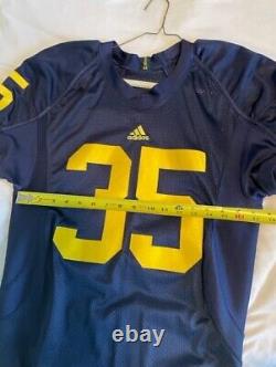 Game used/authentic University of Michigan football jersey